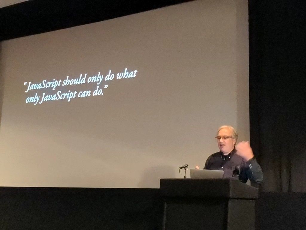 Jeremy Keith standing in front of a screen at a conference.